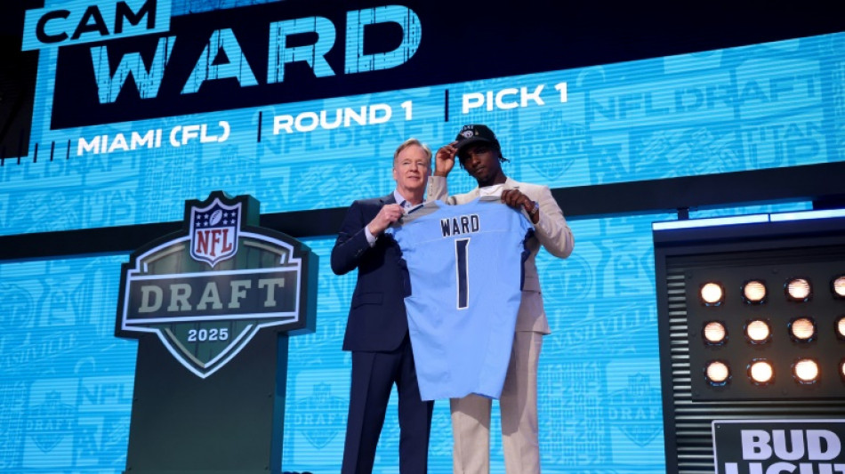 Titans take QB Ward, Jags trade up for two-way star Hunter