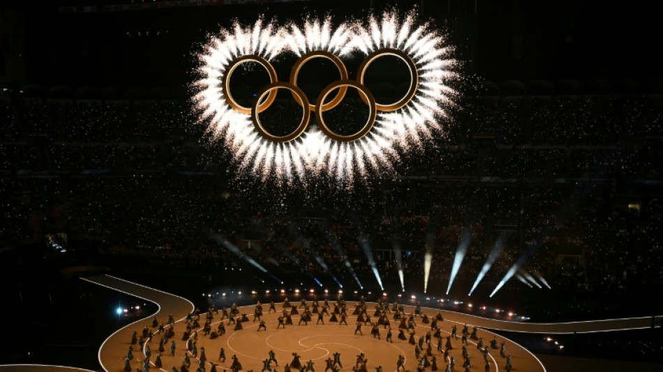 Milan-Cortina Winter Olympics open with glittering ceremony