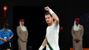 Murray wins Australian Open five-set epic as weather plays havoc