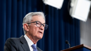 US Fed holds interest rates steady, defying Trump pressure
