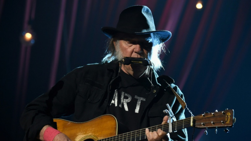 Neil Young says he will play Glastonbury after all