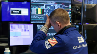 Wall Street limite ses pertes, la nervosité règne