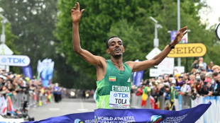 Athl&eacute;tisme: l'Ethiopien Tola champion du monde du marathon