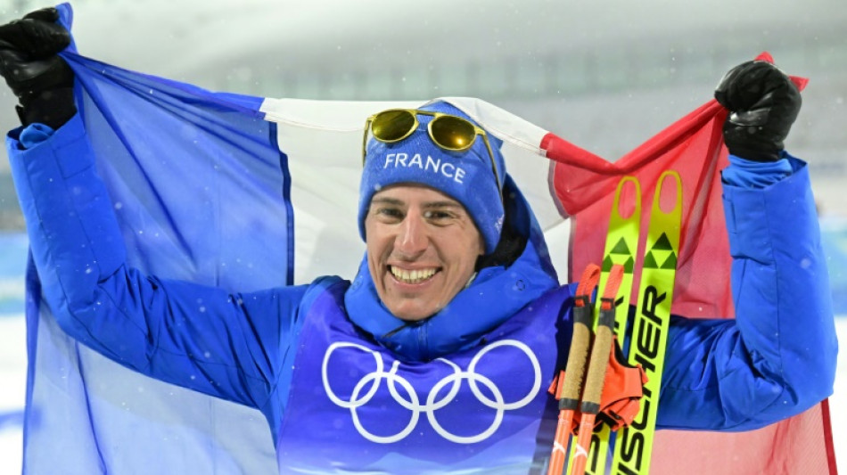 JO-2022: Quentin Fillon Maillet porte-drapeau fran&ccedil;ais &agrave; la c&eacute;r&eacute;monie de cl&ocirc;ture