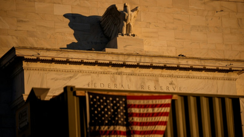 Stocks diverge as AI fears cloud US rate cut