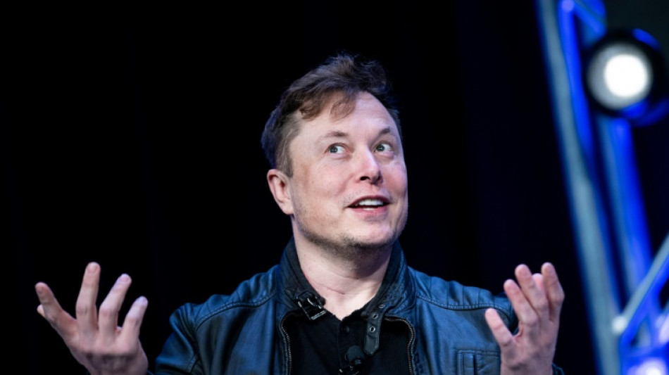 Musk sends mixed messages on Twitter deal, pressuring shares