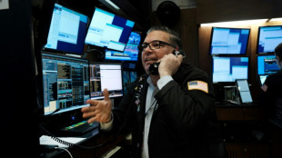 Wall Street de peu dans le vert, tir&eacute;e par Microsoft