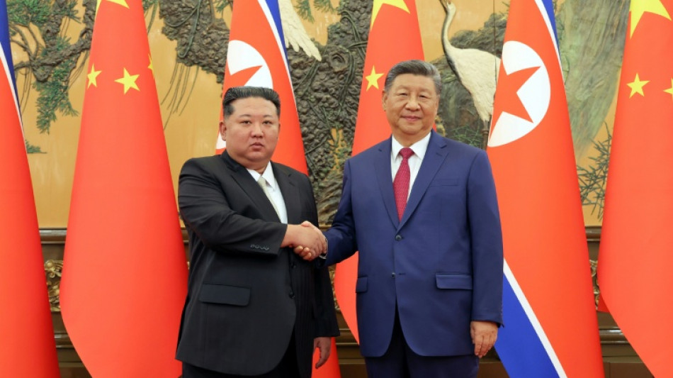 China's Xi lands in North Korea for rare visit