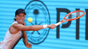 Swiatek retires with illness in Madrid Open third round