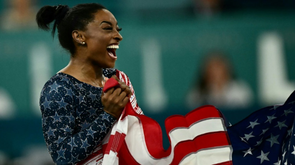 Gymnastique: avec l'or par &eacute;quipe, Biles r&eacute;enchante son histoire olympique