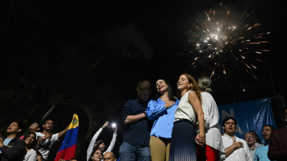 Venezuelan foe of Maduro wins opposition primary, but can she run?